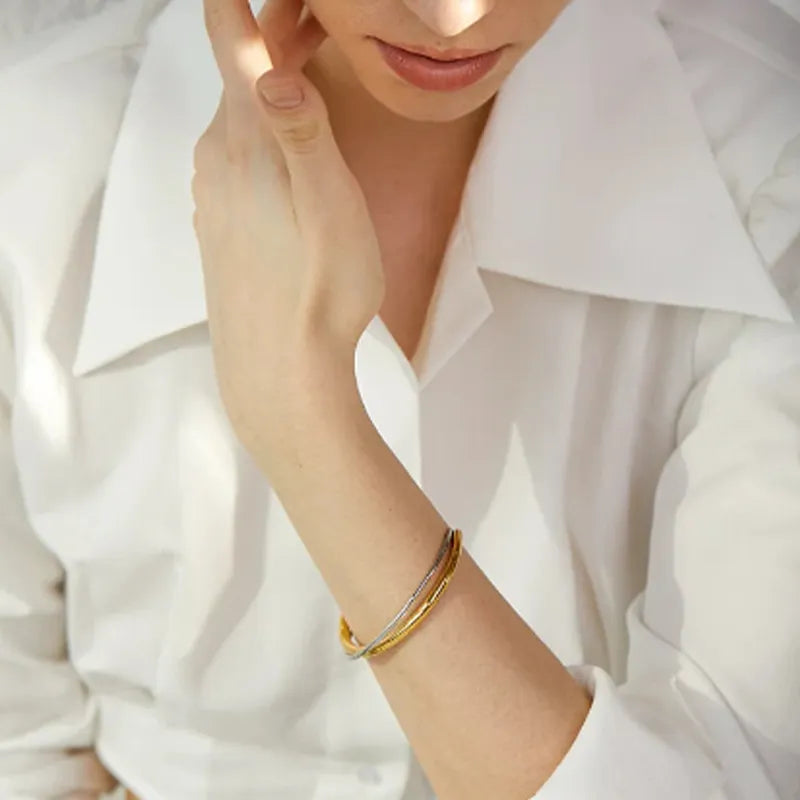 Pulseira Cuff Cruzada Ouro e Prata