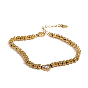 Pulseira de Bolinhas com Pingente de Coração